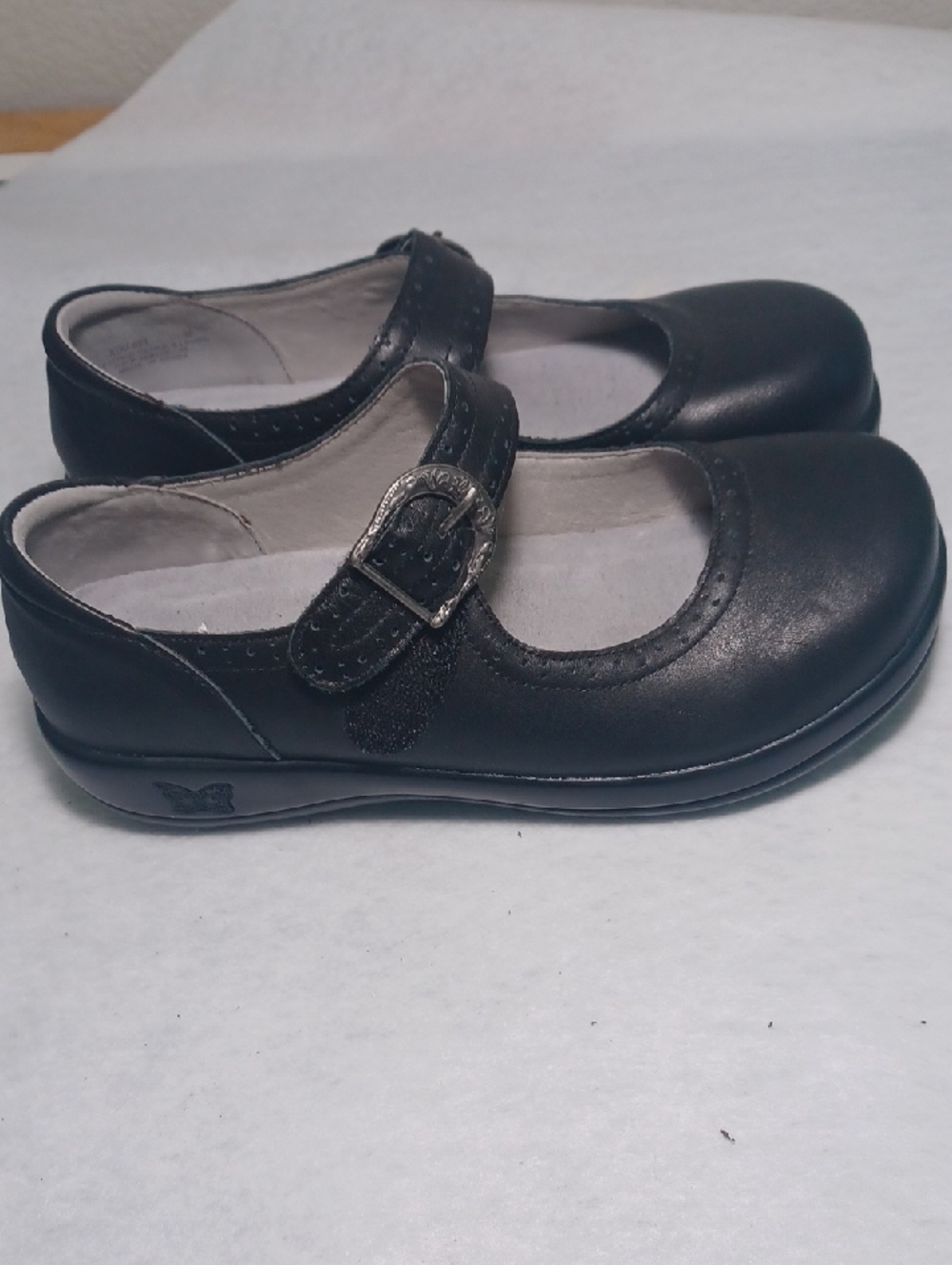 Alegria Clogs With Buckeled Strap.